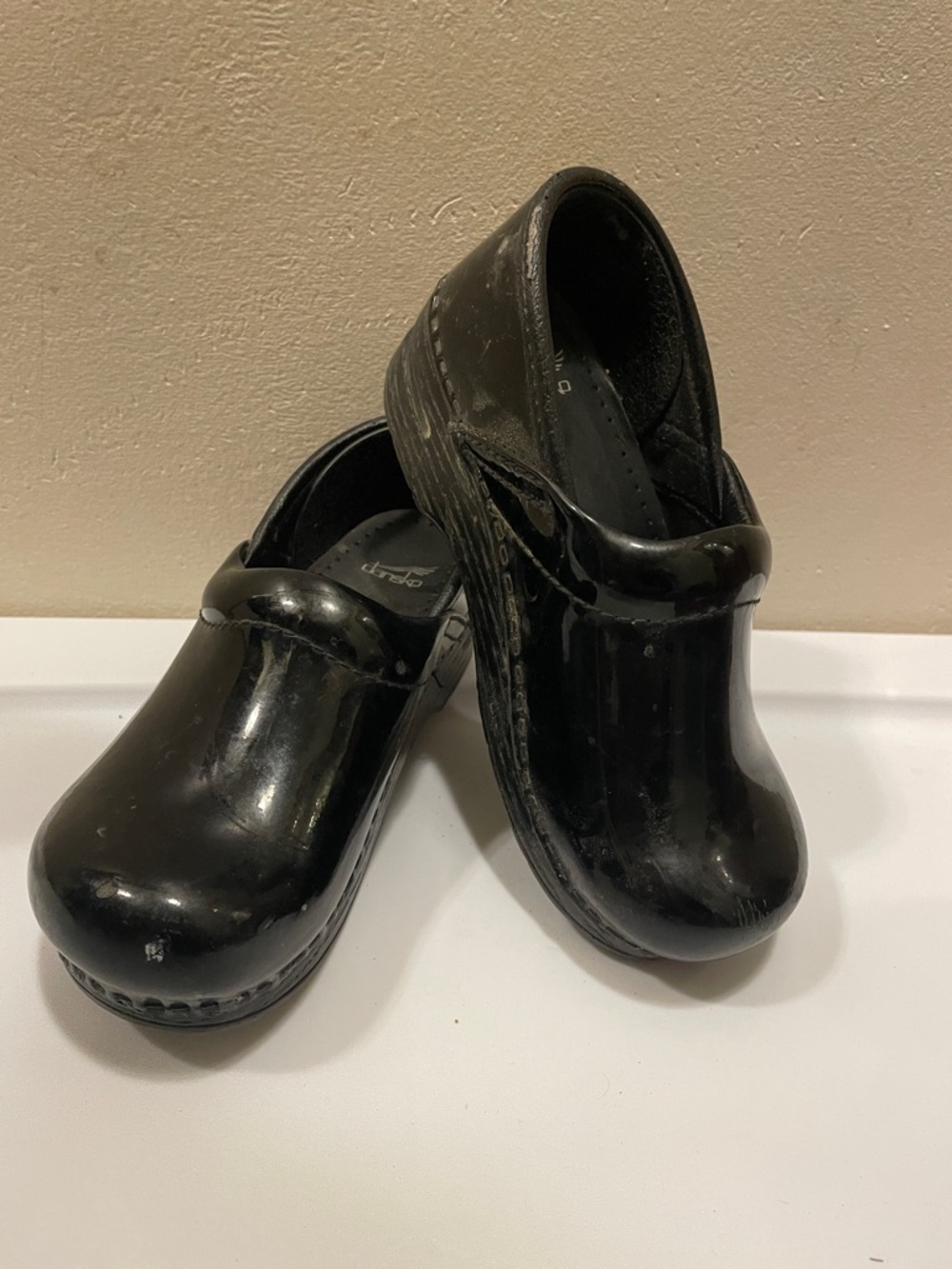 Dansko Kids Black Patent Slip-On Clogs